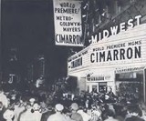 <p>Midwest Theatre, Oklahoma City, Dec. 2, 1960 World Premiere showing of Cimarron. Premiere followed by lot&rsquo;s of festivities i.e. parade, dinners, & party&rsquo;s. Harvey street was blocked off between Grand Ave & Main Street. Band played on street while bright beaming lights pointed skyward. Attending stars included: Glenn Ford, Maria Schell, Anne Baxter & Russ Tamblyn. Movie played reserve seats for 6 record breaking weeks.</p>
              